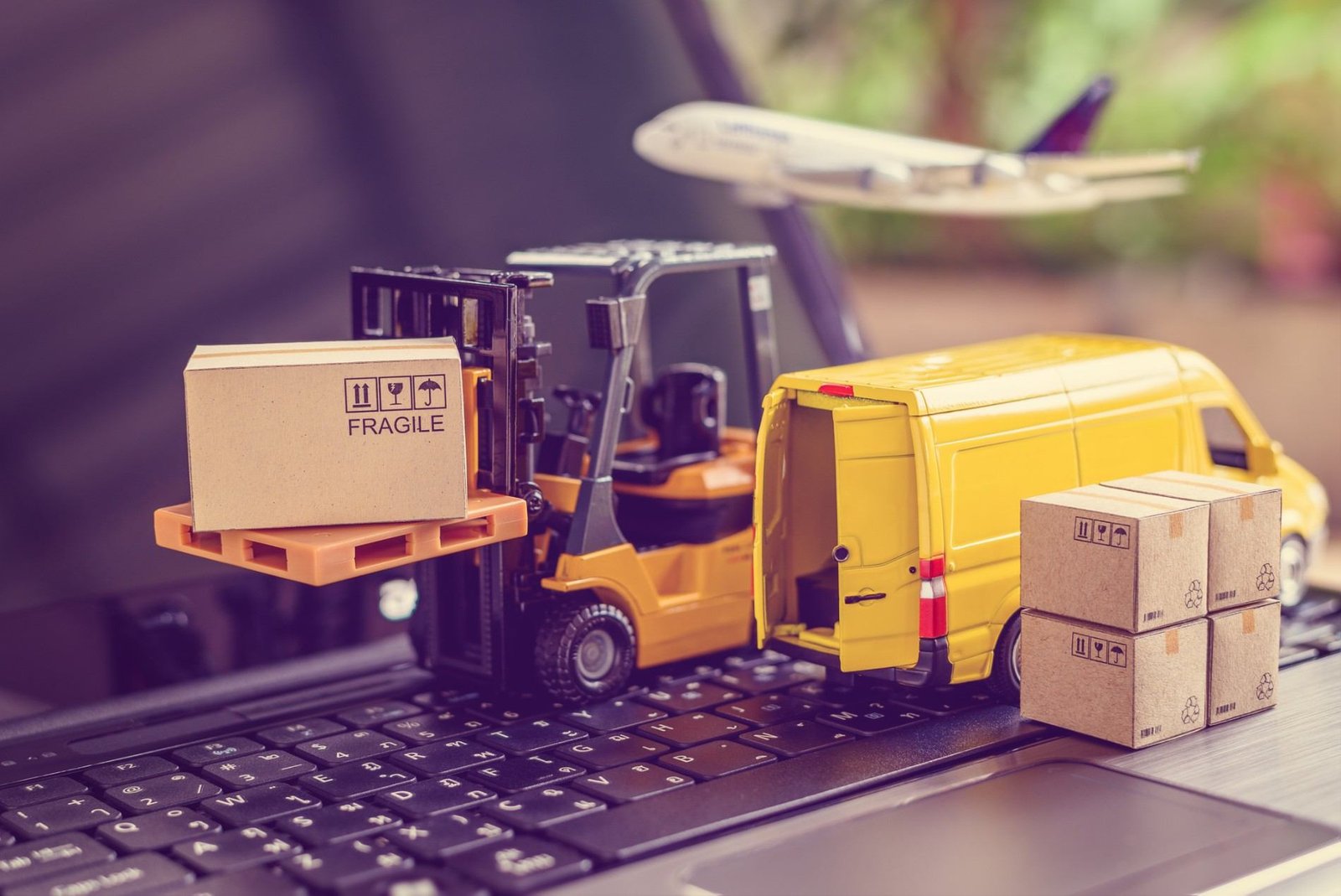 Cartons, forklift and van illustrating cargo loading and logistics planning