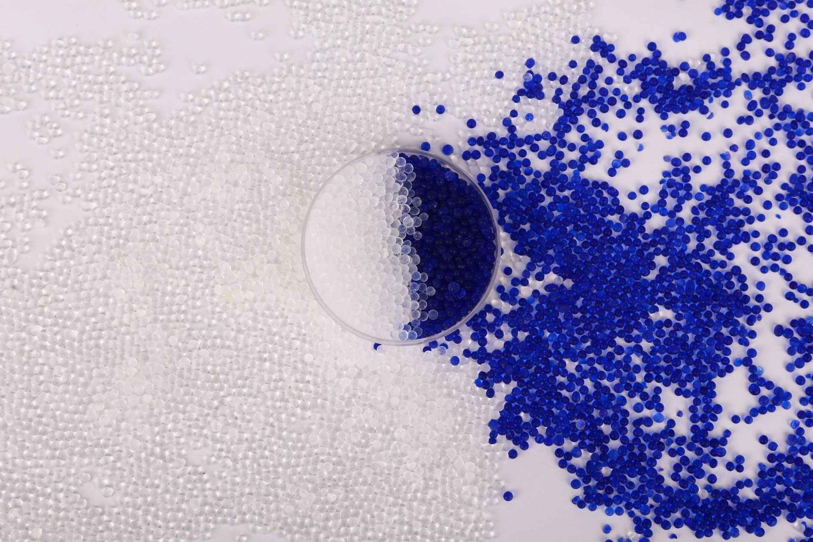 Blue and clear silica gel beads used as desiccant